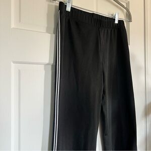 Spandex full length pants with white stripe along side of pants